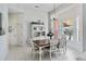 Inviting dining area with elegant furnishings, chandelier, and natural light at 2779 N Beach Rd # A, Englewood, FL 34223