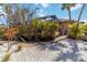 Well maintained front yard with mature landscaping at 2779 N Beach Rd # A, Englewood, FL 34223