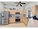 Well-appointed kitchen with stainless steel appliances, light wood cabinets, and plenty of counter space at 2779 N Beach Rd # A, Englewood, FL 34223