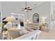Inviting living room featuring a ceiling fan and tile floors at 2779 N Beach Rd # A, Englewood, FL 34223