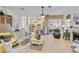 Open living space with bar seating flowing seamlessly from kitchen and other living areas at 2779 N Beach Rd # A, Englewood, FL 34223