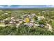 This home is nestled within a serene neighborhood, framed by a backdrop of lush vegetation and waterways at 3215 Cedarbrook Dr, Punta Gorda, FL 33982
