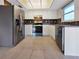 Well-equipped kitchen featuring stainless steel appliances and a sleek backsplash at 3420 Dawson Ln, Punta Gorda, FL 33982