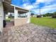 Outdoor patio with brick pavers, providing a perfect spot for entertaining at 3420 Dawson Ln, Punta Gorda, FL 33982