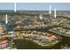 Expansive aerial view of waterfront homes, showcasing the property's location in a desirable coastal neighborhood with water access at 3705 Toulouse Ct, Punta Gorda, FL 33950