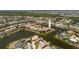 Stunning aerial view of a waterfront home in a vibrant community with picturesque canals and beautiful landscaping at 3705 Toulouse Ct, Punta Gorda, FL 33950