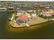 This waterfront home has a spacious yard, dock, and screened-in lanai, perfect for enjoying the outdoor lifestyle at 3705 Toulouse Ct, Punta Gorda, FL 33950