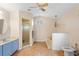 Bright bathroom with a glass door shower, soaking tub, and tiled floors at 3705 Toulouse Ct, Punta Gorda, FL 33950