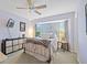 Bedroom featuring modern decor, neutral paint, and a large bed frame at 3705 Toulouse Ct, Punta Gorda, FL 33950