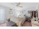 Bedroom featuring a bed frame, carpeted floors, and a ceiling fan at 3705 Toulouse Ct, Punta Gorda, FL 33950