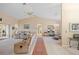 Spacious living room with neutral decor, high ceilings, and plenty of natural light, perfect for entertaining at 3705 Toulouse Ct, Punta Gorda, FL 33950