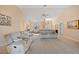 Spacious living room featuring high ceilings, elegant decor, and lots of room for entertaining friends and Gathering at 3705 Toulouse Ct, Punta Gorda, FL 33950