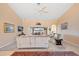 Inviting living room with sliding glass doors leading to a lanai, offering scenic waterfront views and indoor-outdoor living at 3705 Toulouse Ct, Punta Gorda, FL 33950