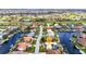 Aerial view of neighborhood with canal access and well-maintained lawns at 3824 Aves Island Ct, Punta Gorda, FL 33950