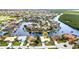 Stunning aerial view of waterfront homes with boat docks and access to a beautiful canal system at 3824 Aves Island Ct, Punta Gorda, FL 33950