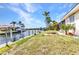 Well maintained lawn with canal and retaining wall at 3824 Aves Island Ct, Punta Gorda, FL 33950