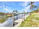 View of the dock with direct access to the canal at 3824 Aves Island Ct, Punta Gorda, FL 33950