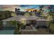 Beautiful single-story home with well-manicured lawn, mature palms and metal roof at 3824 Aves Island Ct, Punta Gorda, FL 33950
