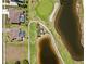 From above, the home sits between a golf course and an adjacent pond at 4001 La Costa Island Ct, Punta Gorda, FL 33950