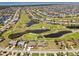An aerial view captures the home's location on the golf course at 4001 La Costa Island Ct, Punta Gorda, FL 33950