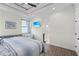 A bright and relaxing main bedroom that leads to a spa-like bathroom at 4001 La Costa Island Ct, Punta Gorda, FL 33950
