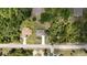 An aerial view shows the home, neighboring houses, and the surrounding community at 4127 Snowdrop St, North Port, FL 34288