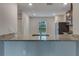 Modern kitchen featuring granite countertops and stainless steel appliances at 4127 Snowdrop St, North Port, FL 34288