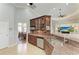 This kitchen features stainless steel appliances, granite countertops, custom cabinetry, and a convenient breakfast bar at 420 Wabash Ter, Port Charlotte, FL 33954