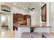 A gourmet kitchen featuring granite countertops, stainless steel appliances and a breakfast bar with seating at 420 Wabash Ter, Port Charlotte, FL 33954