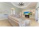 Open concept living area featuring a large sectional couch and a built in media center at 420 Wabash Ter, Port Charlotte, FL 33954