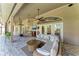 Spacious covered patio area with comfortable seating, perfect for entertaining or relaxing at 420 Wabash Ter, Port Charlotte, FL 33954