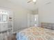 View of the primary bedroom with an ensuite bathroom at 4343 Killdeer Ter, North Port, FL 34288