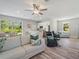 Spacious living area with an open floorplan to the kitchen and dining at 4343 Killdeer Ter, North Port, FL 34288
