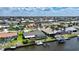 Waterfront homes with boat docks, pools, and well-kept yards in a vibrant coastal community at 505 Via Cintia, Punta Gorda, FL 33950