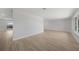Bright, open floor plan featuring newly installed floors and neutral paint palette at 505 Via Cintia, Punta Gorda, FL 33950