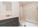 Bathroom featuring vanity with drawers, and shower at 5121 Chaves Cir, Port Charlotte, FL 33948