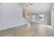 Spacious living room features neutral paint, tile floors, windows, and an open layout at 5121 Chaves Cir, Port Charlotte, FL 33948