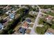 Aerial view highlighting property lines, surrounding neighborhood, and waterfront access at 7225 Sea Mist Dr, Port Charlotte, FL 33981