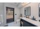 Bathroom featuring a modern vanity, a window, and sleek fixtures at 7225 Sea Mist Dr, Port Charlotte, FL 33981