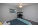 Bedroom with window, ceiling fan and carpet at 7225 Sea Mist Dr, Port Charlotte, FL 33981