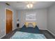 Bedroom with window, ceiling fan and carpet at 7225 Sea Mist Dr, Port Charlotte, FL 33981