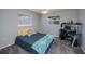 Bedroom with ceiling fan and a window and desk at 7225 Sea Mist Dr, Port Charlotte, FL 33981
