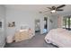 Large bedroom featuring a full length mirror and a view of the screened lanai at 7225 Sea Mist Dr, Port Charlotte, FL 33981