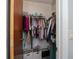 Walk-in closet with built-in shelving and ample storage for clothing and accessories at 7225 Sea Mist Dr, Port Charlotte, FL 33981
