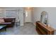 Inviting living room featuring tile flooring, a cozy couch, and neutral decor at 7225 Sea Mist Dr, Port Charlotte, FL 33981