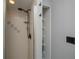 Shower featuring black hardware and ceramic tile walls at 7225 Sea Mist Dr, Port Charlotte, FL 33981
