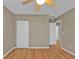 A secondary bedroom with an open doorway and a large closet at 8172 Trionfo Ave, North Port, FL 34287