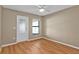 Neutral secondary bedroom with window and door to exterior, offering lots of natural light at 8172 Trionfo Ave, North Port, FL 34287