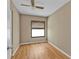 A secondary bedroom with neutral paint, ceiling fan, and window with blinds at 8172 Trionfo Ave, North Port, FL 34287