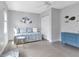 Bedroom with daybed, ceiling fan, and unique decor at 859 Napoli Ln, Punta Gorda, FL 33950